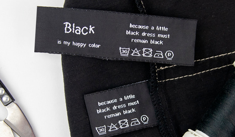 middenvouw kledinglabel, lettertype Kristen